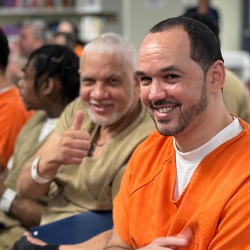 Two Inmates smiling