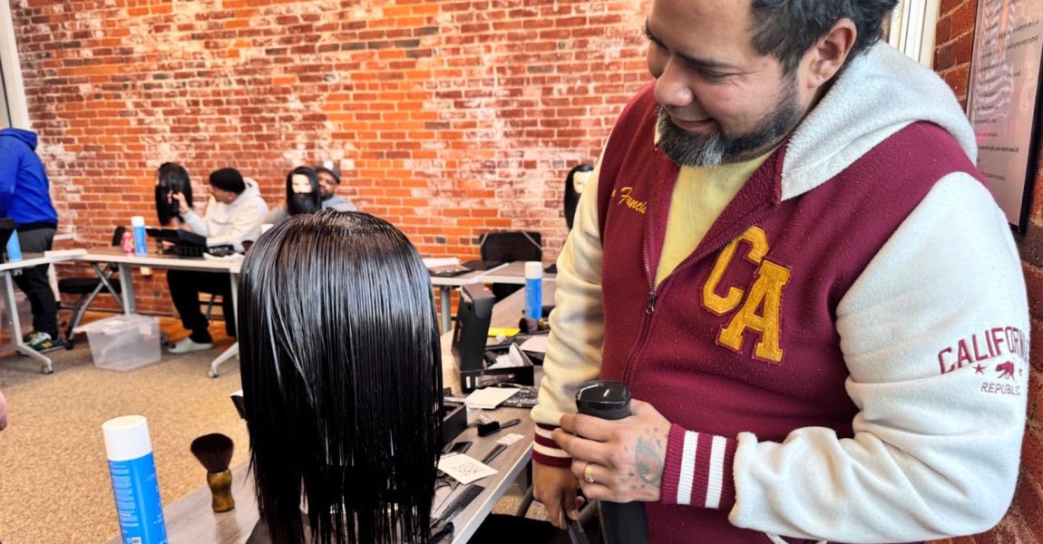 Workforce training - man learning how to style hair
